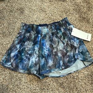 Size 10 lululemon track that 5 inch shorts